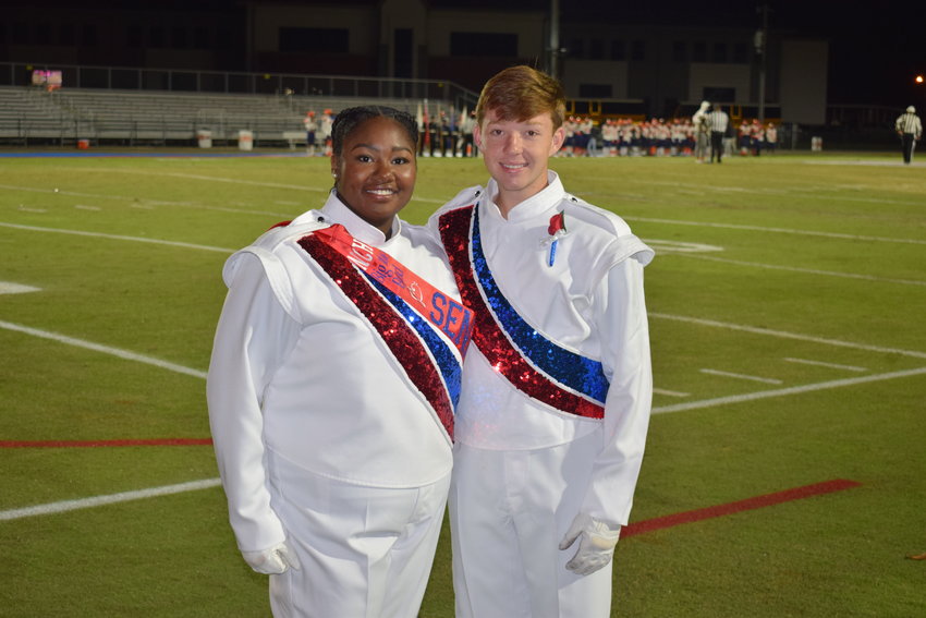 Destiny Kirksey, left, head drum major, and Hunter Adkins, right, co-drum major, both seniors at Neshoba Central High School, are enjoying their roles this year with Neshoba Central’s Big Blue Band.